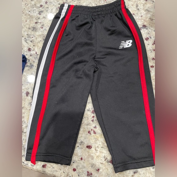 New Balance Other - 💥 New Balance💥Kids' Black Joggers with Red and White Stripes Like New SZ 12 M